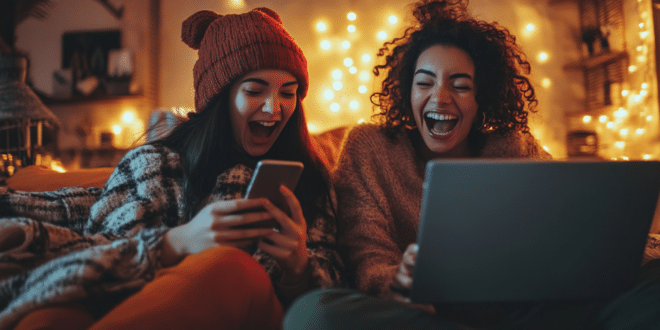 Des femmes rigolent en utilisant ChatGPT.