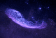 Un nuage brillant dans un ciel étoilé