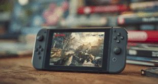 Une Nintendo Switch 2 posée sur une table, avec l'écran affichant un jeu
