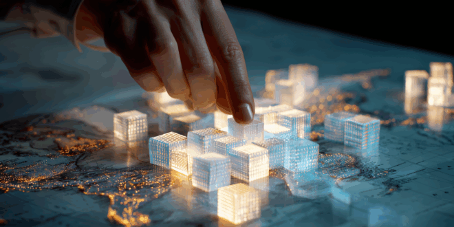 une main qui structure des blocs