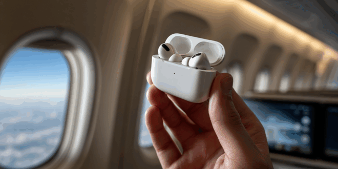 des AirPods 3 dans un avion.