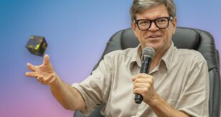 Yann LeCun et une cube flottant dans sa main