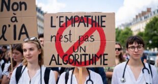 des psys en grève avec pancarte "l'empathie n'est pas un algotithme" et "non à l'IA"