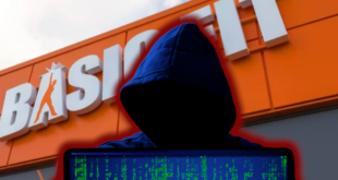 un hacker avec PC devant l'enseigne de Basic Fit pour illustrer la cyberattaque