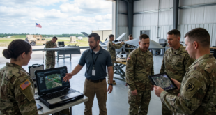 Image représentant des militaires et des techniciens qui mettent au point du matériel de guerre révolutionnaire