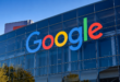 Façade moderne du siège de Google illustrant les investissements massifs d’Alphabet dans l’intelligence artificielle.